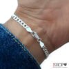 detalle pulsera cubana 4 mm de plata 925 en sus terminales en la muñeca