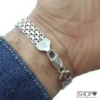 Detalle de broche tipo langosta con sello Italy 925 de pulsera tejido chino gruesa JShop.